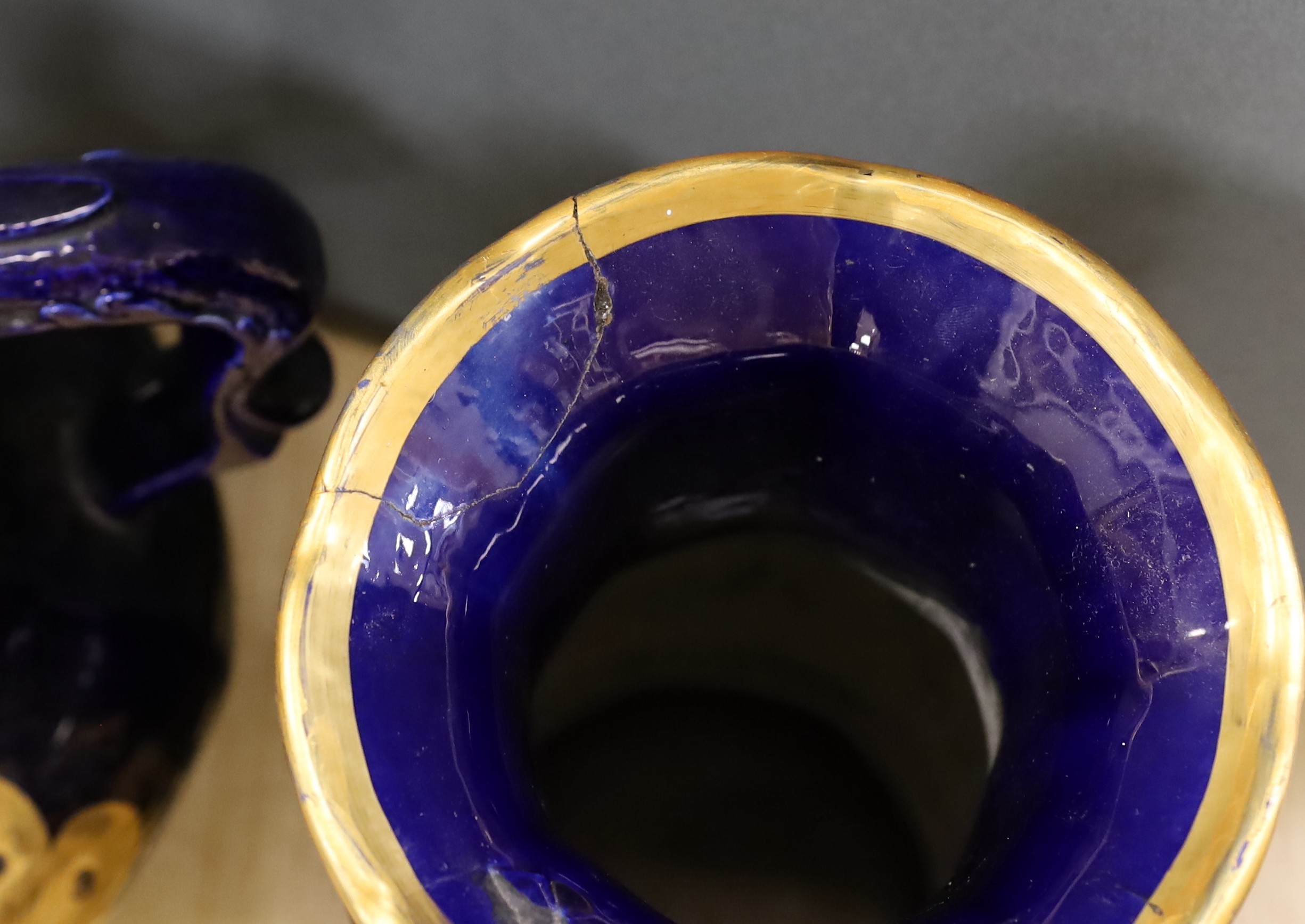A large early 19th century Masons ironstone cobalt blue and gilt decorated jug and two similar large vases, tallest 37cms high